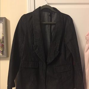 Women’s dark denim color jacket.